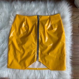 Yellow faux patent leather skirt from Boohoo